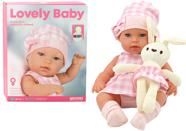 Baby doll in a bunny carrier in a pink checkered outfit