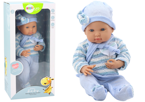 Babypuppe, gestreifter Pullover, Mütze, blauer Schal