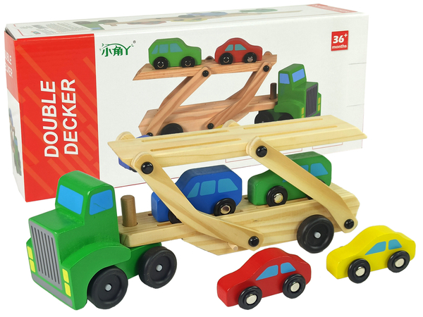 Grüner Holzlastwagen mit Lastwagenblöcken