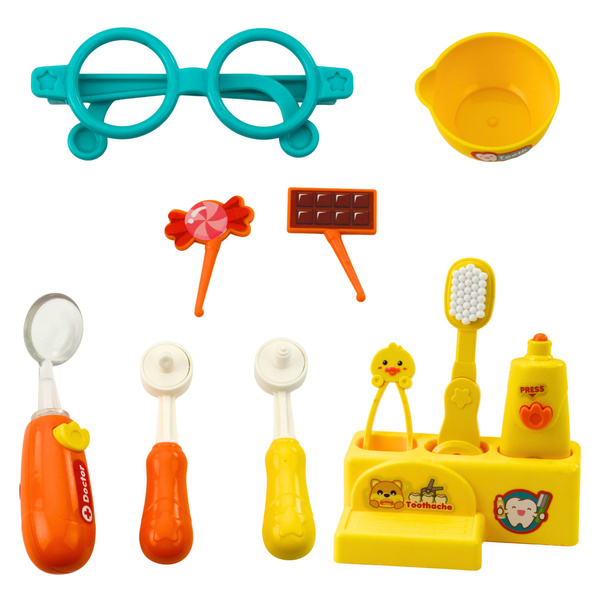 Hund beim Zahnarzt Spielzeugarzt mit krankem Zahn