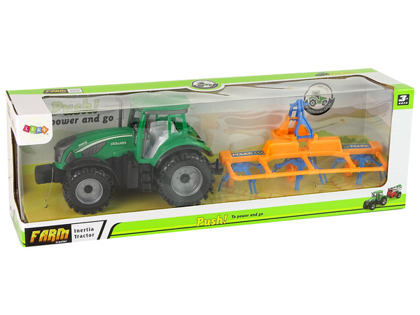Grüner Traktor mit orangefarbener und blauer Harke Reibungsantrieb