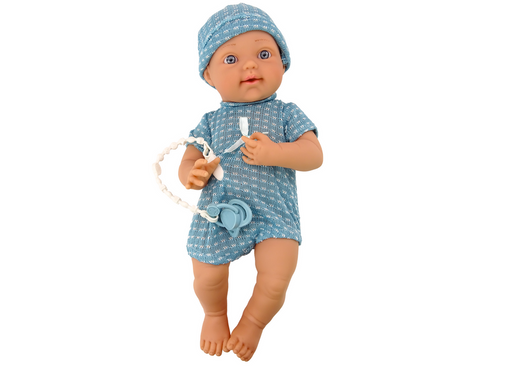 Baby doll in blue clothes, hat, pacifier, and blanket