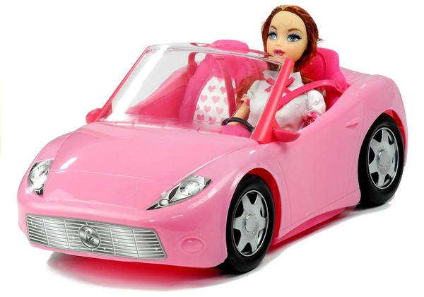 Doll Travelling with a Cabrio Car