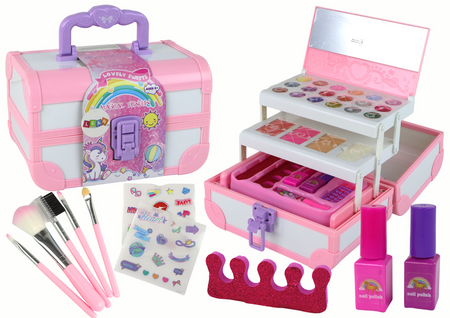 Set of beauty cosmetics for make-up doing nails in a pink case
