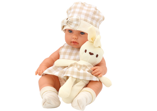 Baby doll in a carrier, a bunny, in a checkered outfit, beige