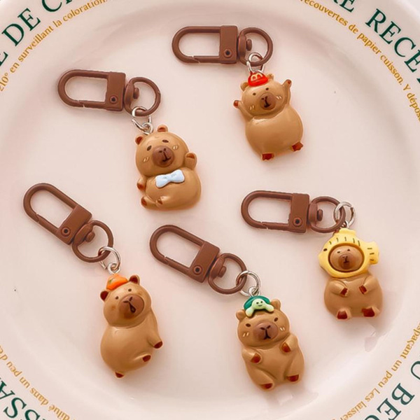 Set mit Mini-Capybara-Schlüsselanhängern, Figuren, Schlüsseldekorationen, 4 Stück.