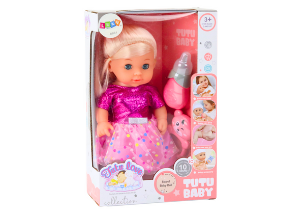 Puppe im rosa Kleid pinkelt Flaschenrasselgeräusche