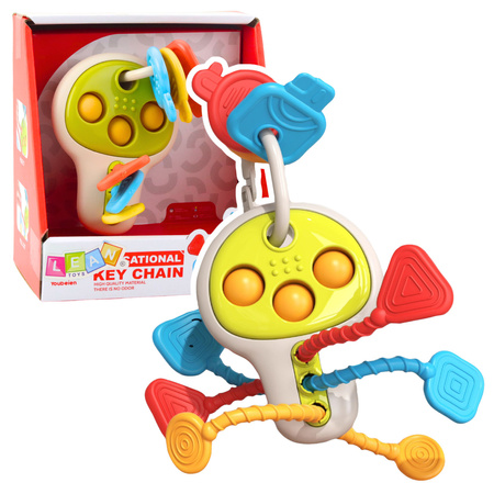 EDUCATIONAL SENSORY KEYS WITH MOVING ELEMENTS