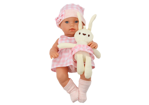 Baby doll in a bunny carrier in a pink checkered outfit
