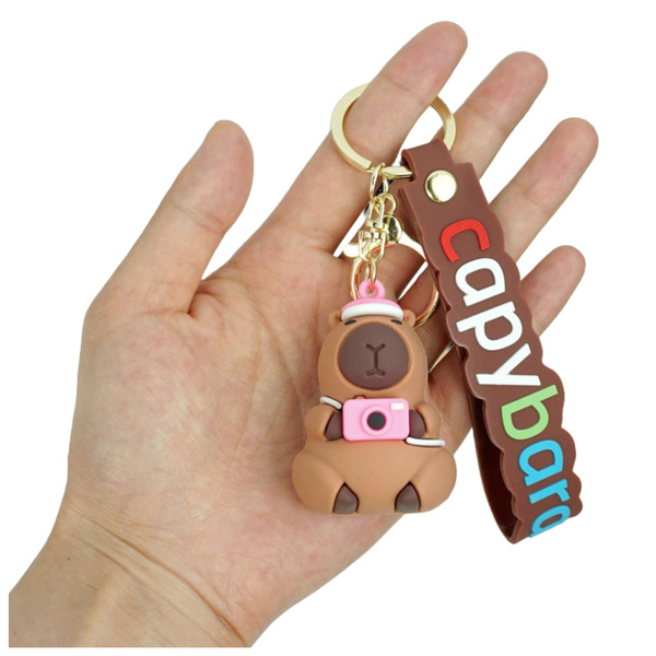 Schlüsselanhänger Capybara Figur mit Kamera und Hut Anhänger Karabinerring